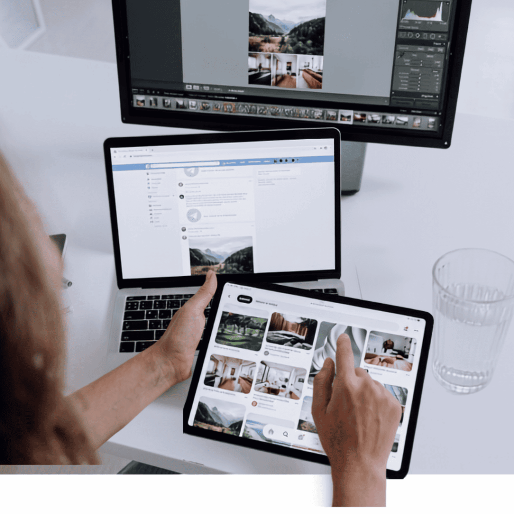 lady with ipad, laptop and desktop looking at designs lady with ipad, laptop and desktop looking at designs