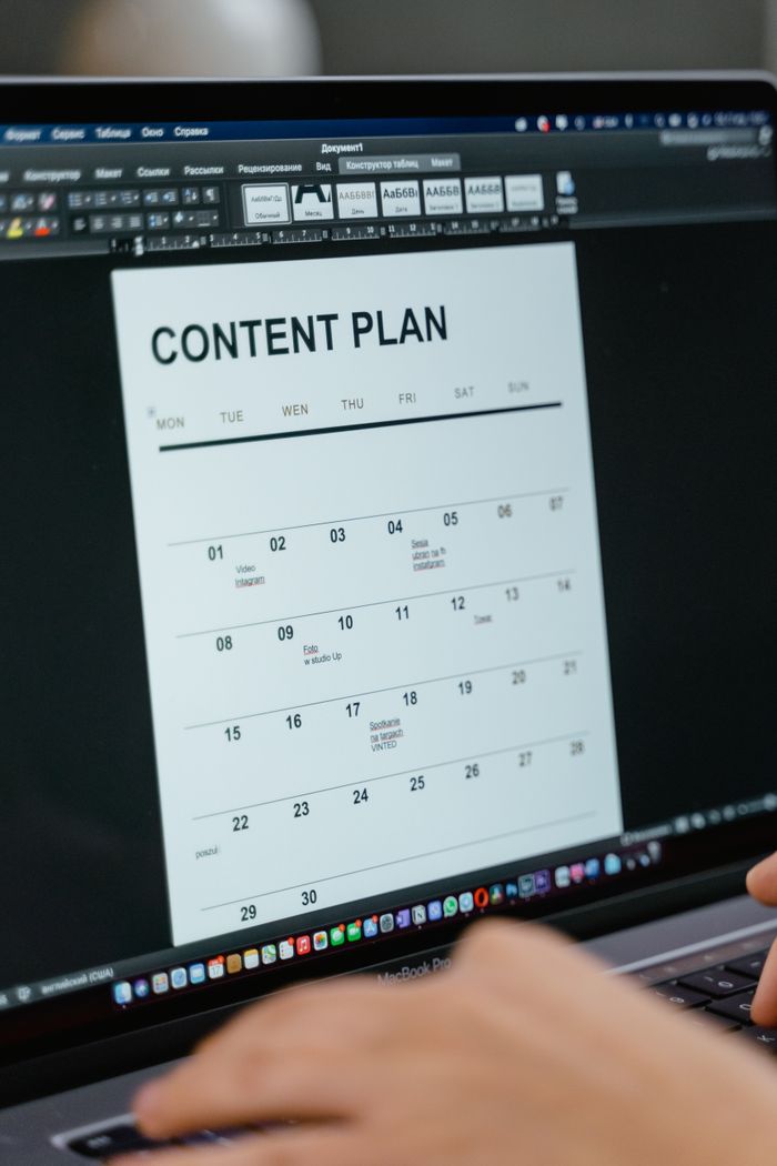 Services Close-up of digital content plan on laptop screen, ideal for scheduling visuals.